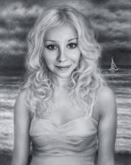 Portrait of blonde girl on the seashore